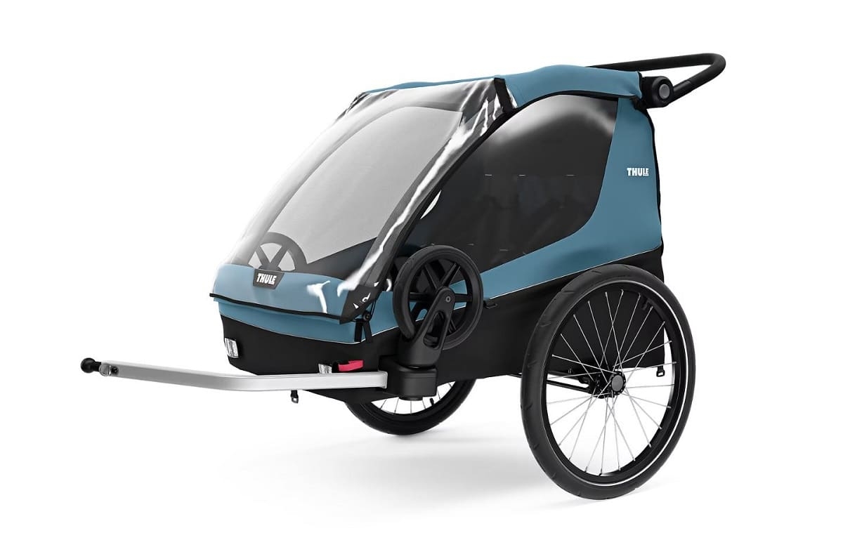 Stilvoller Thule Fahrradanhänger Courier in Blau. Perfekt für Transport und Freizeitaktivitäten. Sicher und komfort